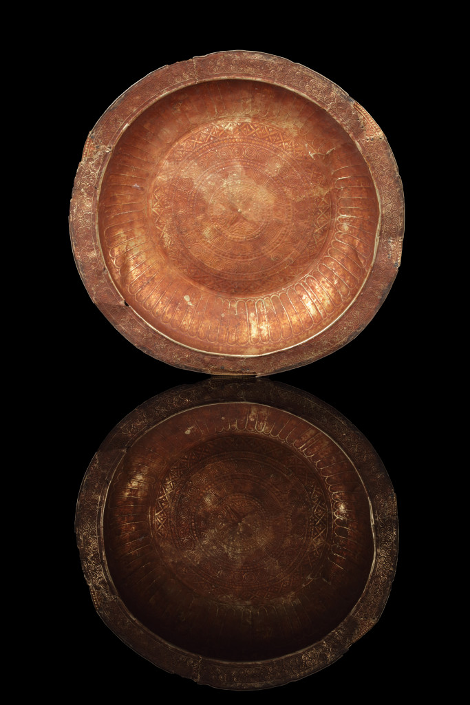 A collection of Tanimbar gold repoussé dishes