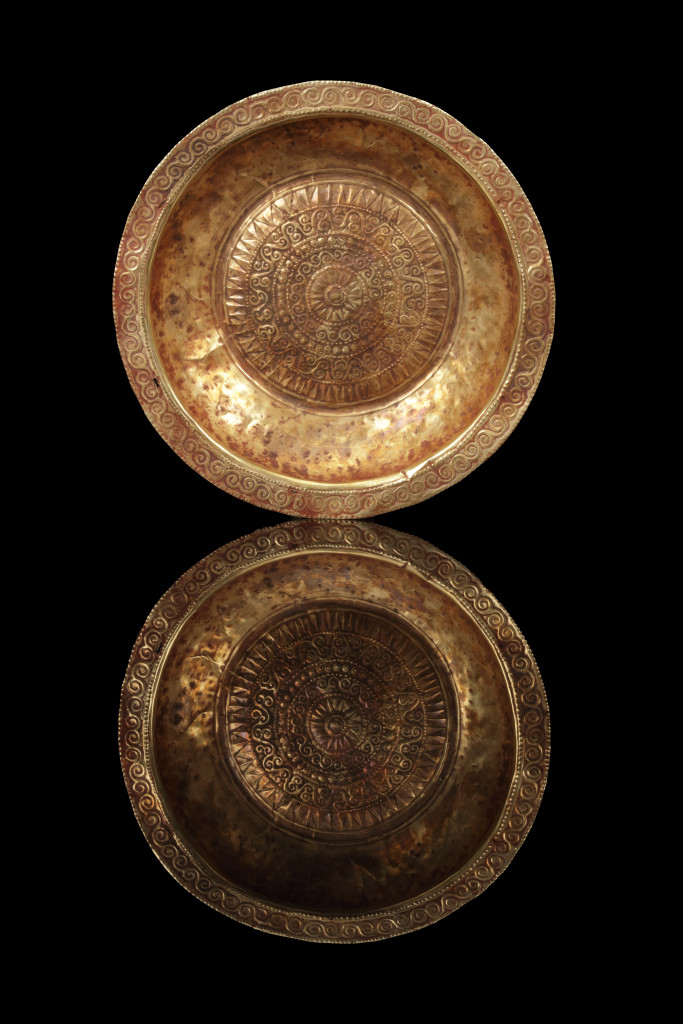 A collection of Tanimbar gold repoussé dishes