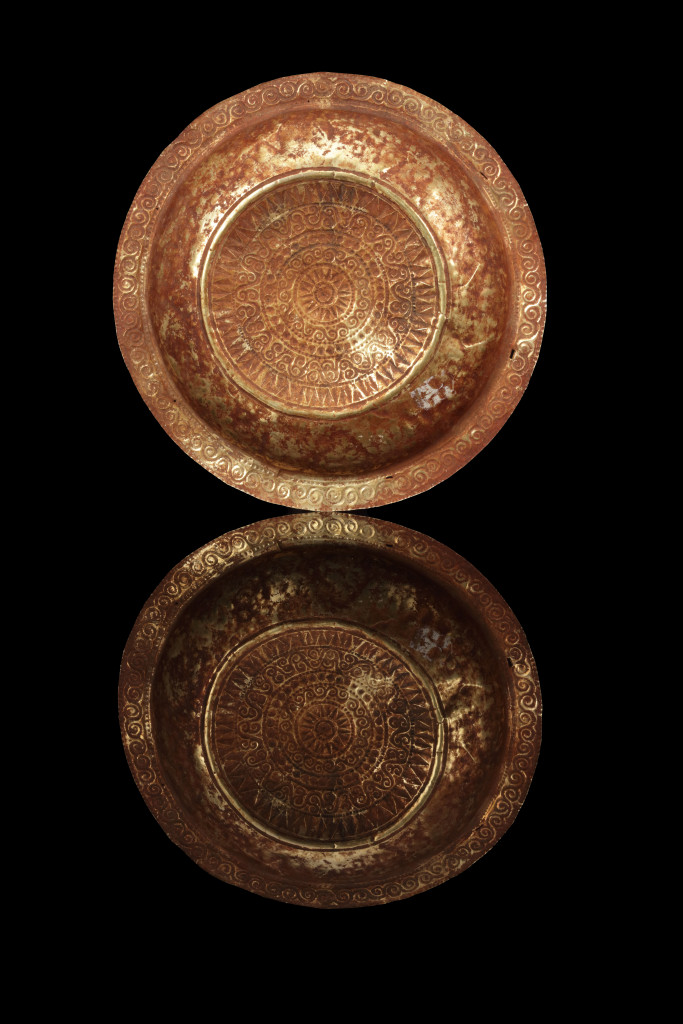 A collection of Tanimbar gold repoussé dishes