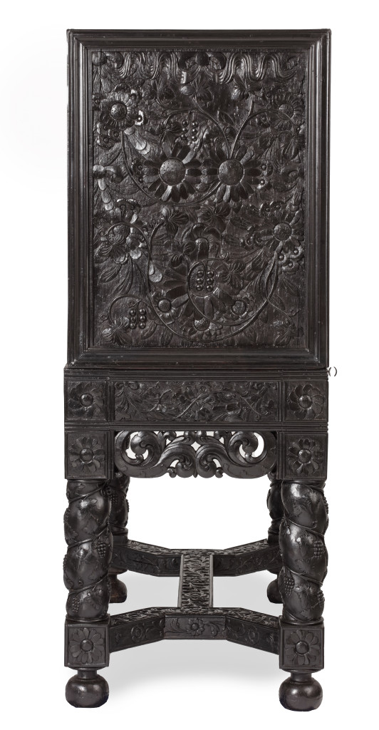 A Dutch-colonial Indonesian ebony cabinet on stand