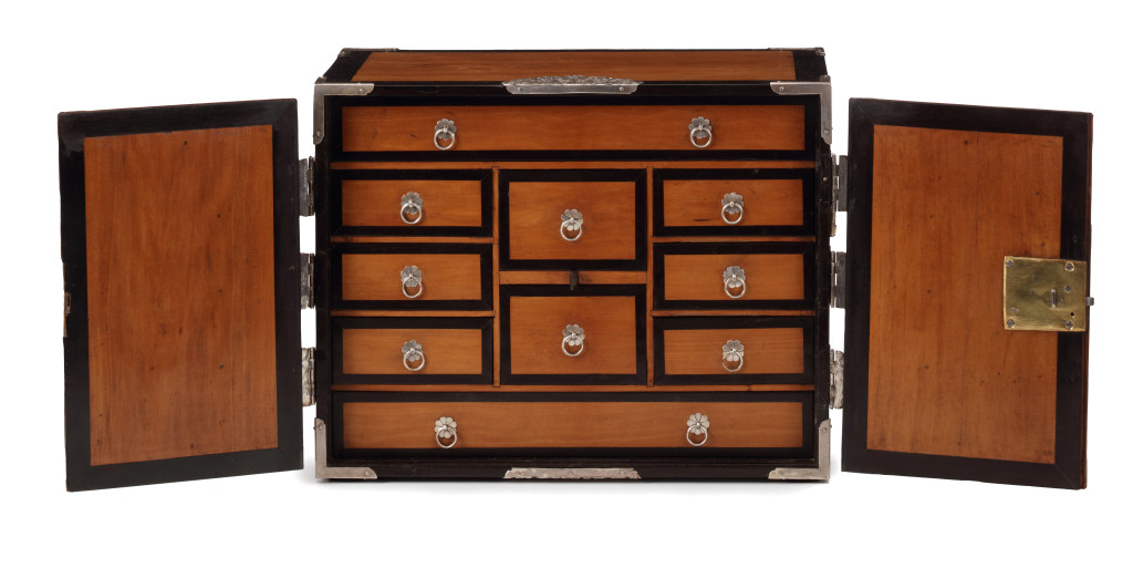 A Dutch-colonial amboyna and ebony collector's cabinet with silver mounts