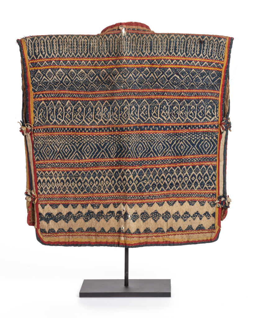 A fine cotton needlework and bark cloth lining Dayak child’s jacket