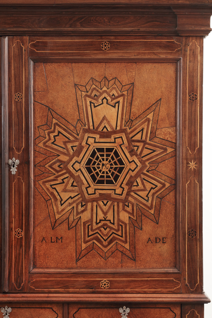A Dutch-colonial cabinet on stand with marquetry depiction of Fort Almada in Portugal
