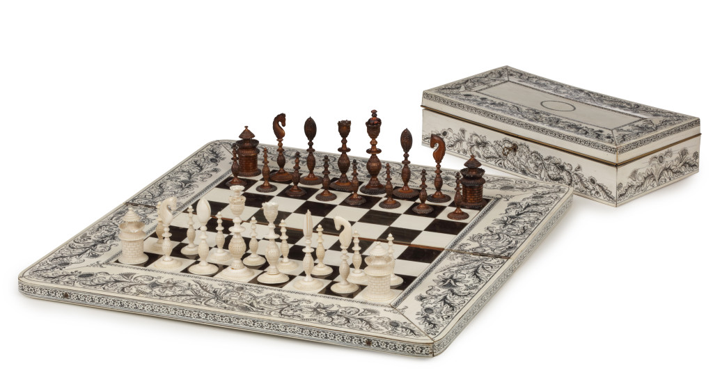 An Anglo-Indian 'vizagapatam' pen-engraved ivory chess set