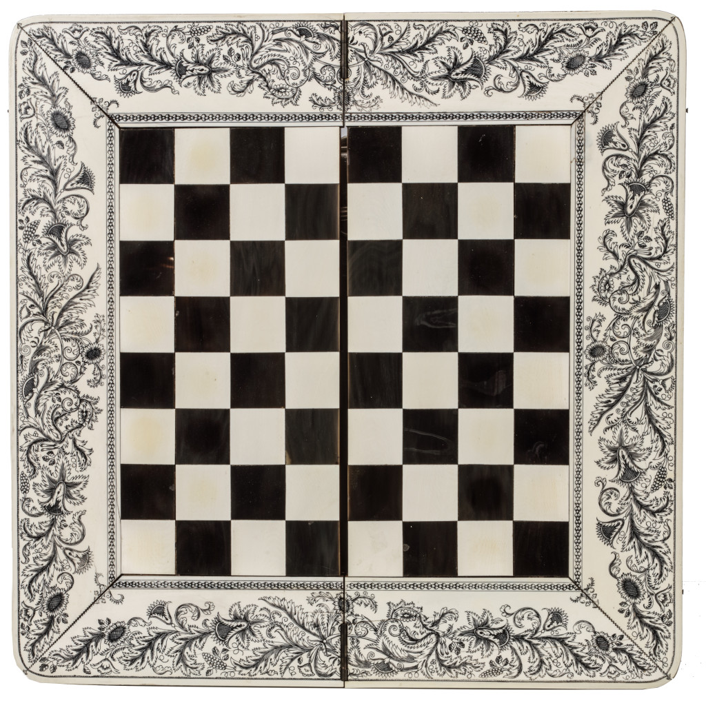 An Anglo-Indian 'vizagapatam' pen-engraved ivory chess set