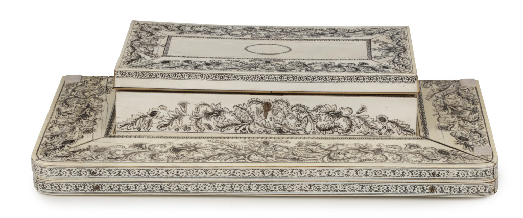 An Anglo-Indian 'vizagapatam' pen-engraved ivory chess set