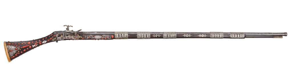 An Ottoman red-coral and silver inlaid snap lock rifle