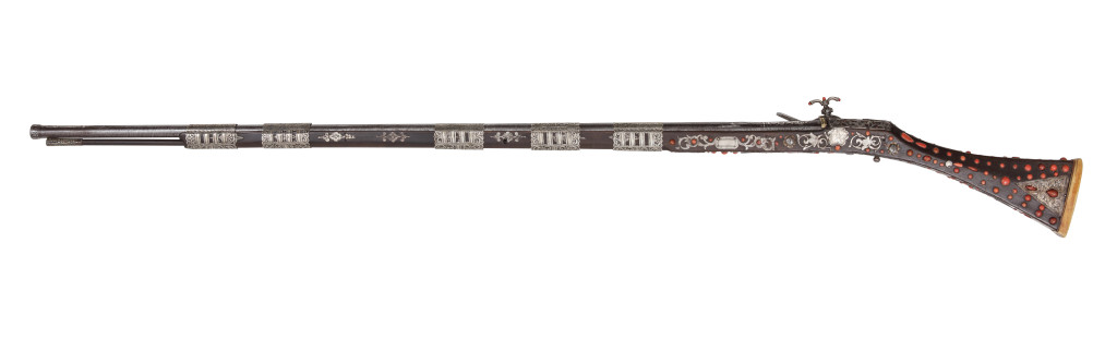An Ottoman red-coral and silver inlaid snap lock rifle