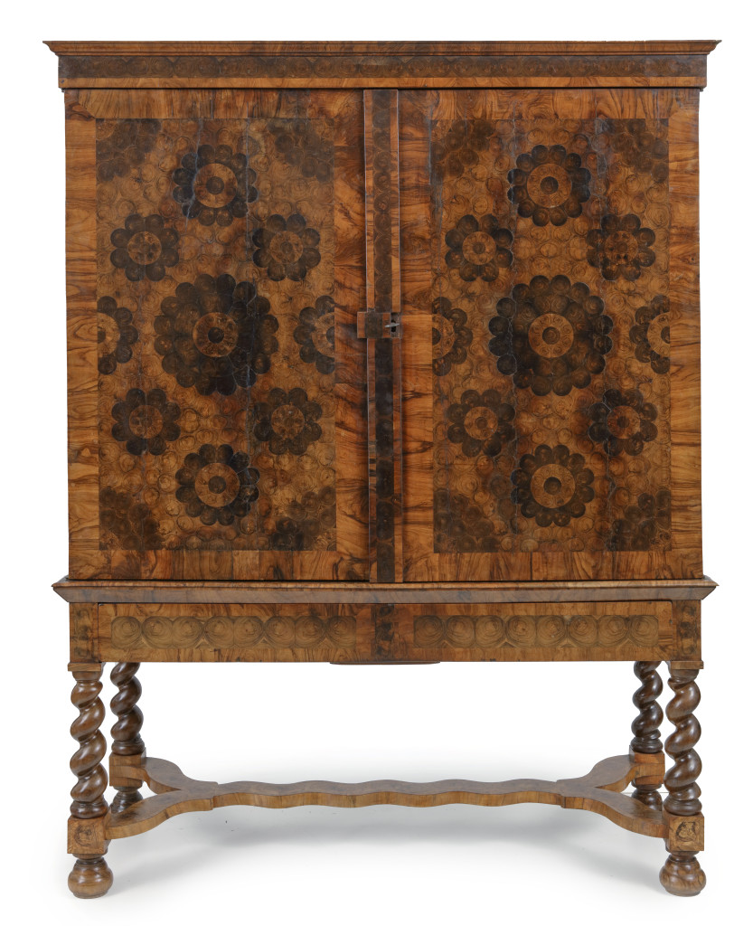 A highly refined Dutch oyster veneered olive wood cabinet on stand