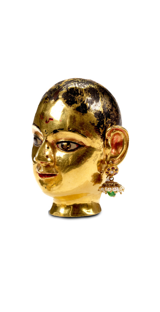 An Indian gem-set gold head of the Goddess Gauri