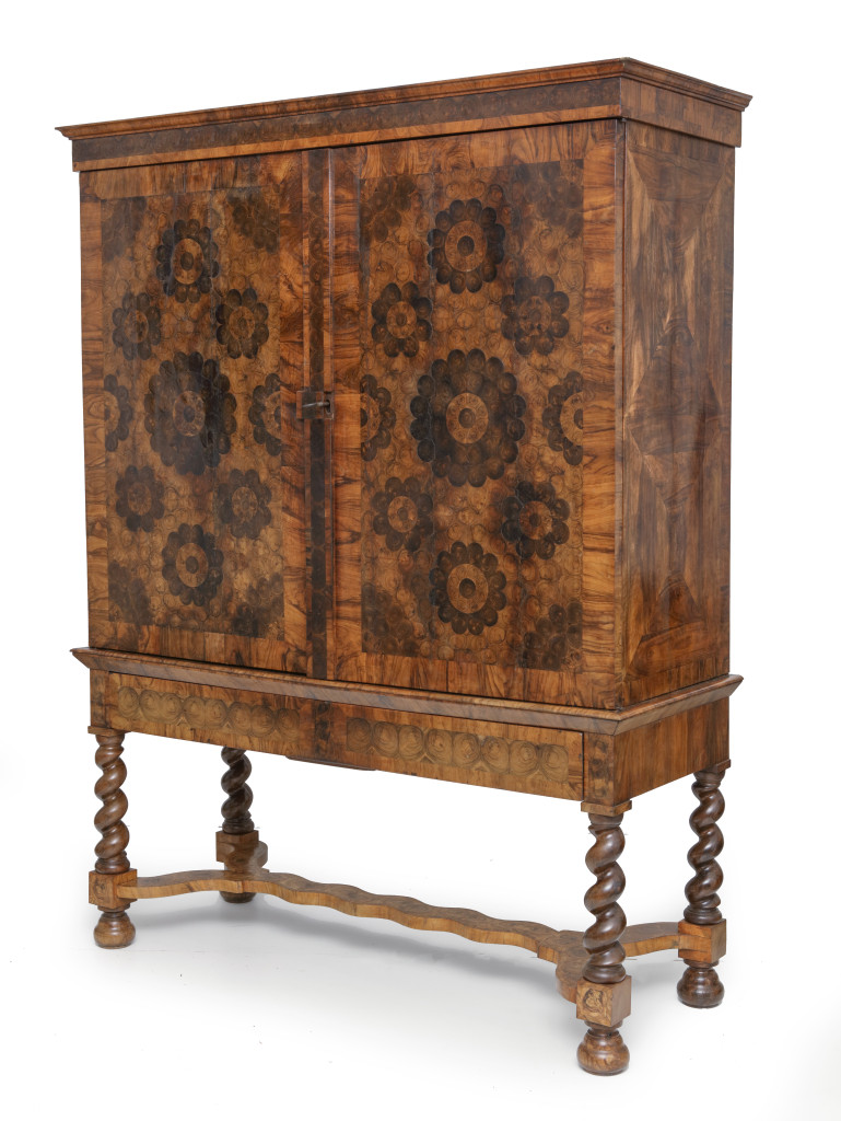A highly refined Dutch oyster veneered olive wood cabinet on stand