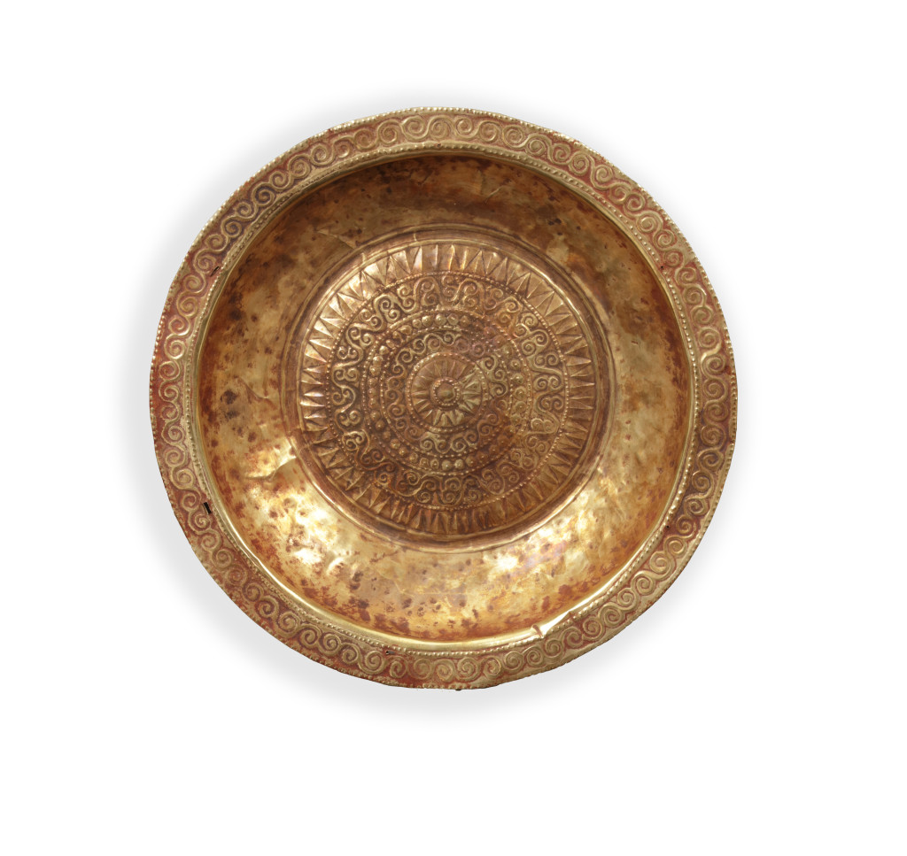 A collection of Tanimbar gold repoussé dishes