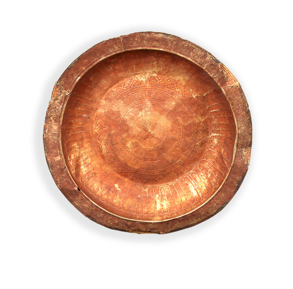 A collection of Tanimbar gold repoussé dishes