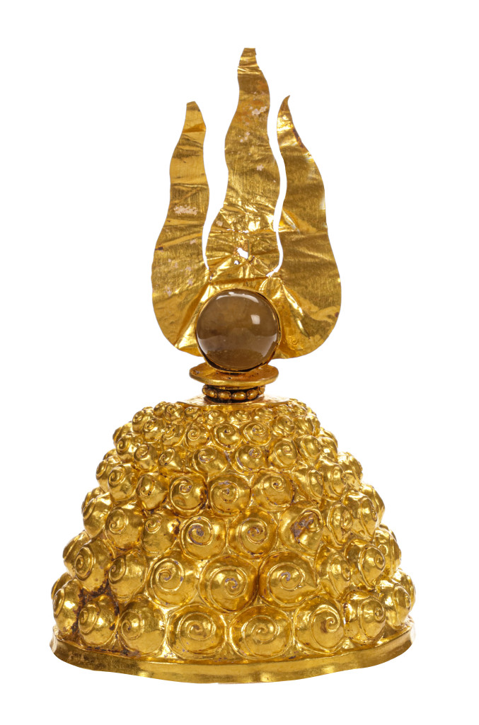 An ancient Javanese royal gold part adornment set for a queen, consisting of a topknot crown with a rock-crystal finial, a breast ornament, a belt, and a pair of gem-set upper-arm bracelets, each in repoussé high-carat gold