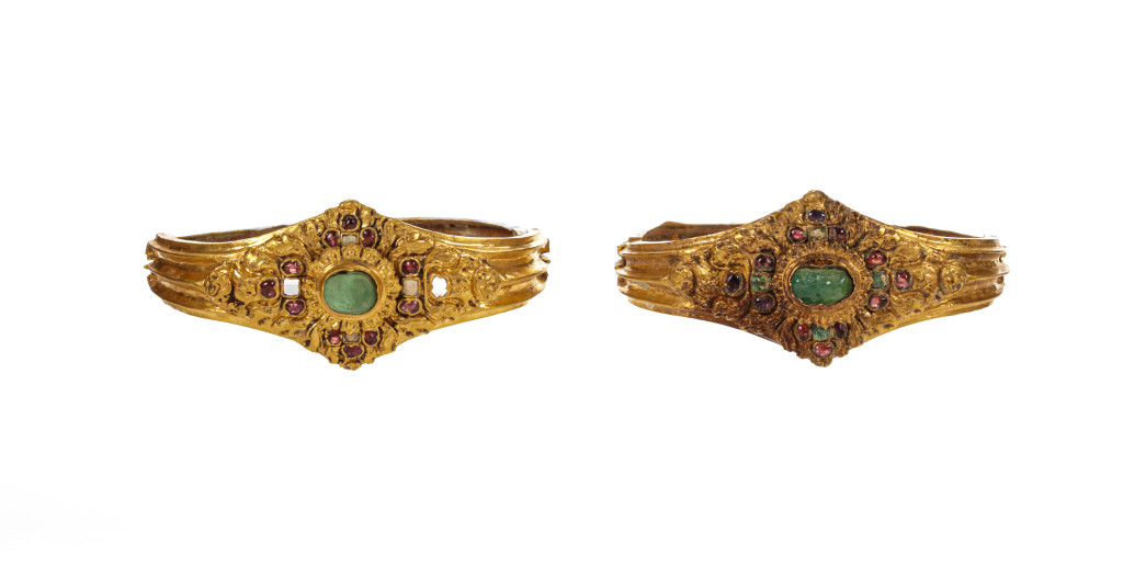 An ancient Javanese royal gold part adornment set for a queen, consisting of a topknot crown with a rock-crystal finial, a breast ornament, a belt, and a pair of gem-set upper-arm bracelets, each in repoussé high-carat gold