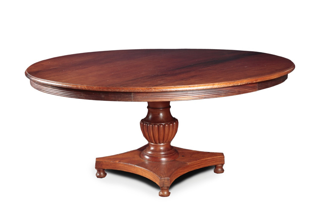 An impressive Dutch-colonial Indonesian amboyna and teak pedestal table