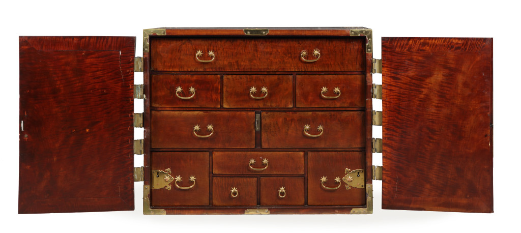 A near pair of Dutch-Colonial Japanese chestnut cabinet chests with brass mounts