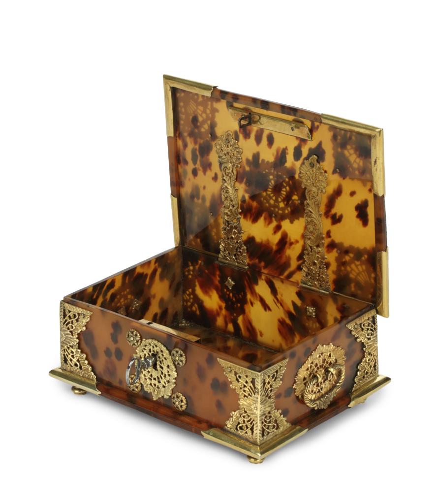 An Indonesian tortoiseshell betel or sirih box with gold mounts
