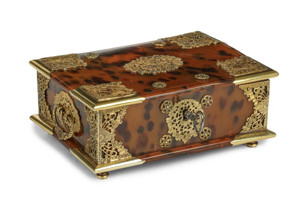 An Indonesian tortoiseshell betel or sirih box with gold mounts