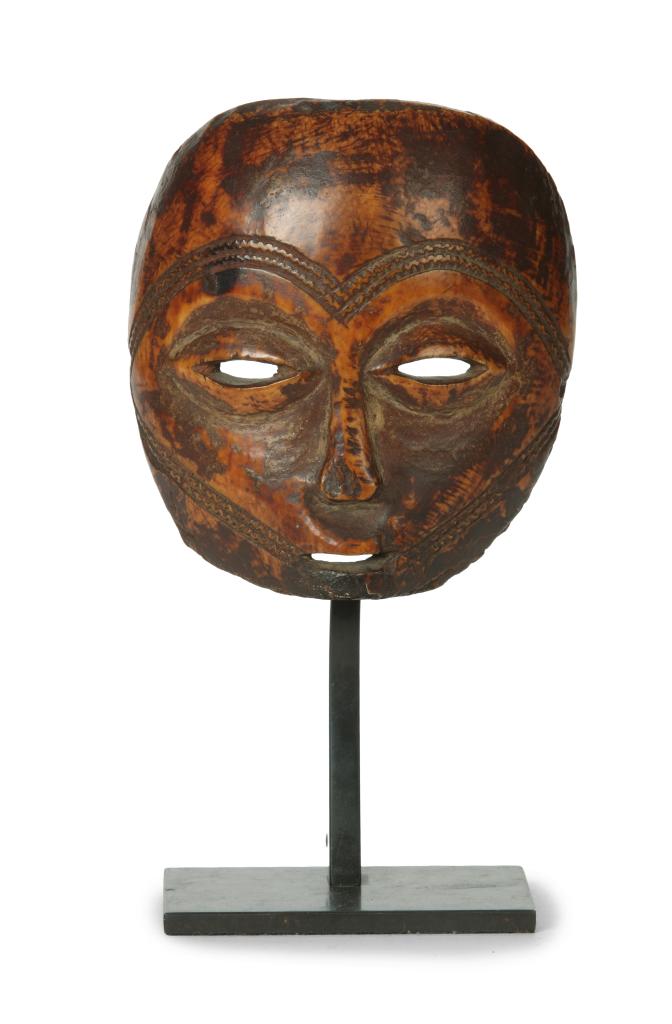 An ivory Lega 'Lukungu' mask