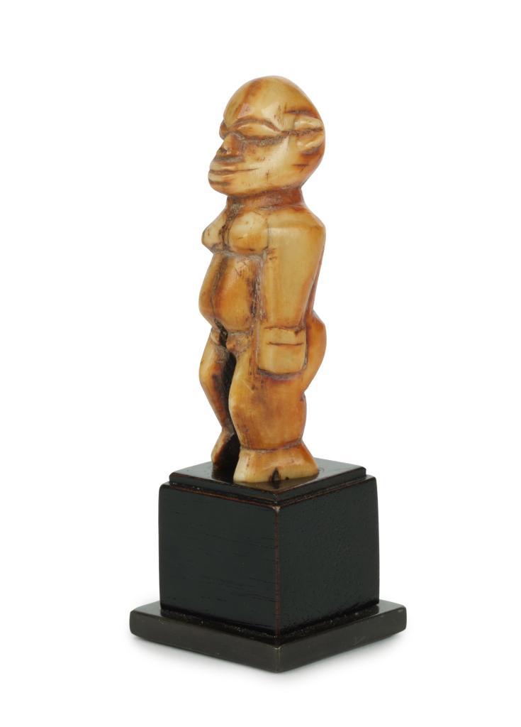 A Lobi ivory ‘Pumbiira Thuno’ miniature statuette