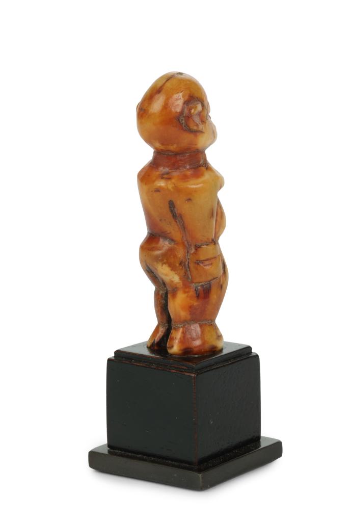 A Lobi ivory ‘Pumbiira Thuno’ miniature statuette