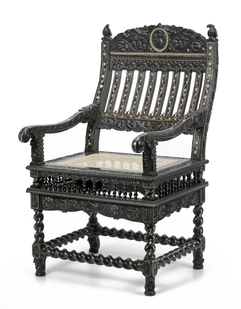 An extremely important ivory-inlaid ebony armchair