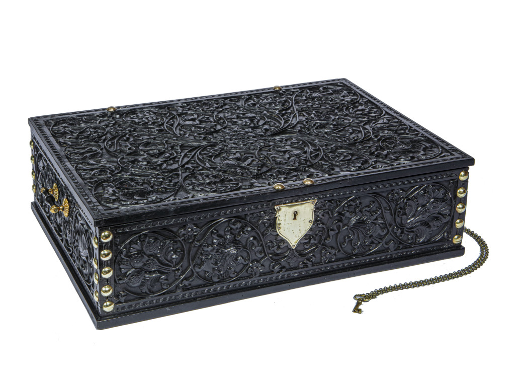 A fine high-relief carved ebony document box                 