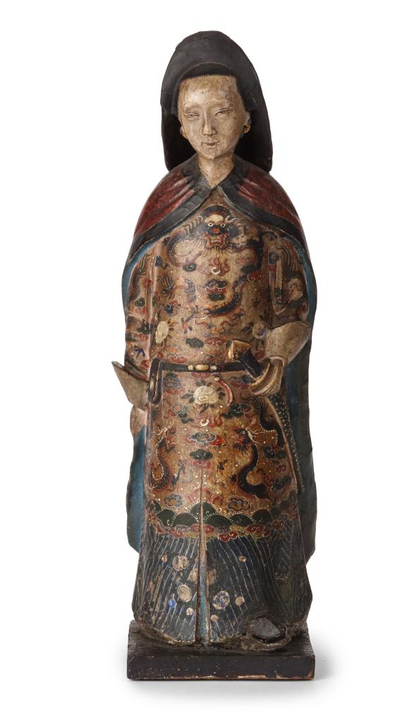 A large Chinese export unfired-clay polychrome painted figure of a female deity
