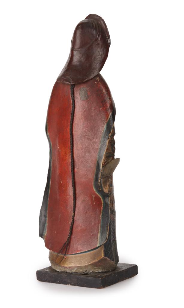 A large Chinese export unfired-clay polychrome painted figure of a female deity