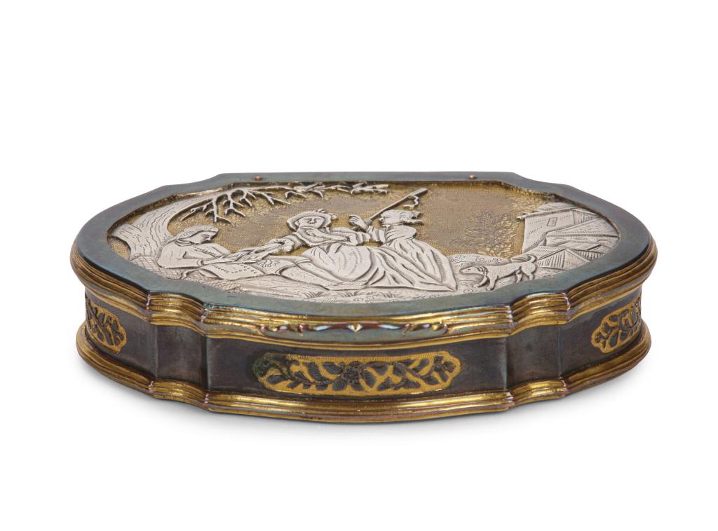 A ruyi-shaped Shakudo-style erotic tobacco or snuff box, relief-decorated with silvered applied figures