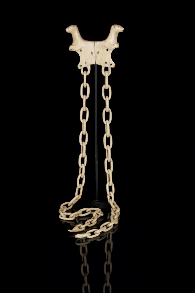 An Inuit walrus ivory kayak harpoon rest