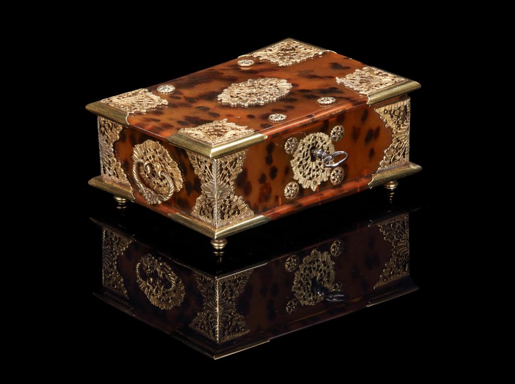 An Indonesian tortoiseshell betel or sirih box with gold mounts