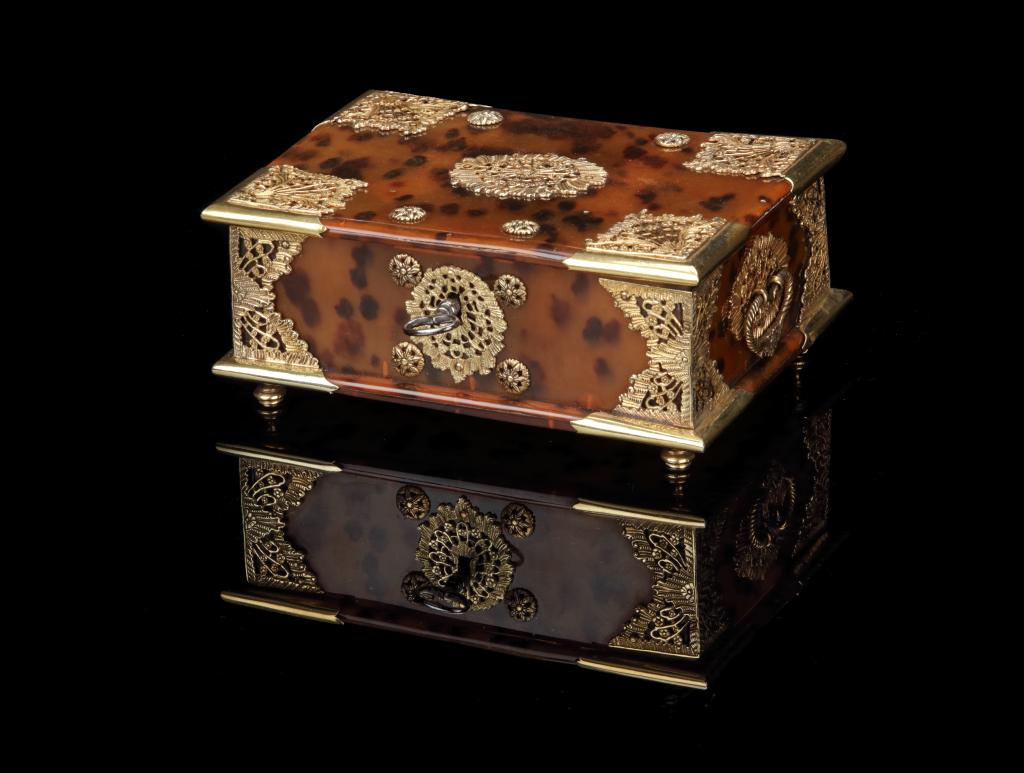 An Indonesian tortoiseshell betel or sirih box with gold mounts