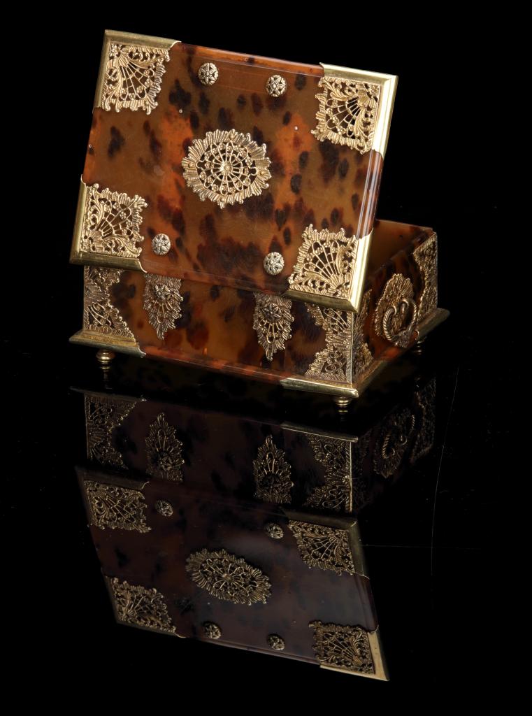 An Indonesian tortoiseshell betel or sirih box with gold mounts