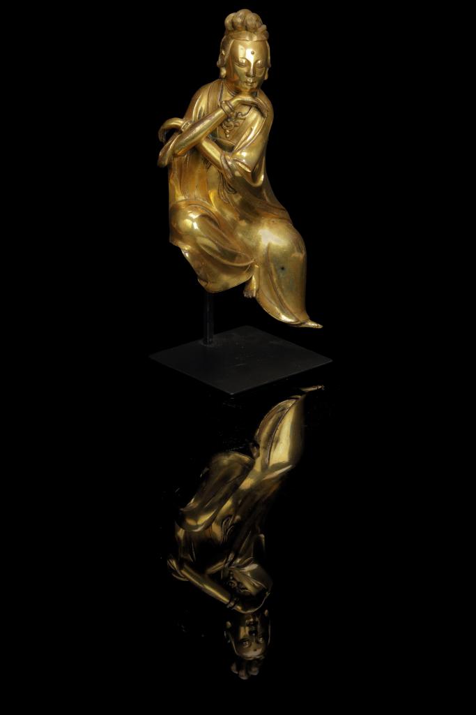 A highly important gilt-bronze figure of the water moon Guanyin