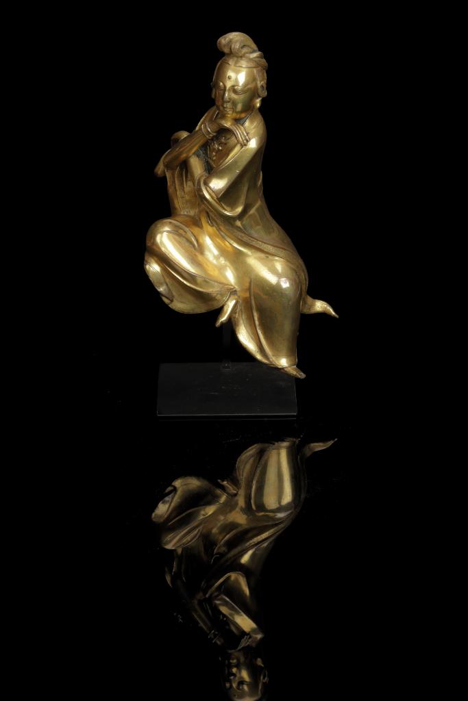 A highly important gilt-bronze figure of the water moon Guanyin
