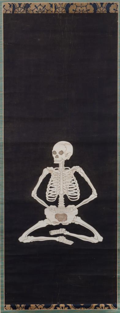 A Japanese hanging scroll painting of a meditating skeleton