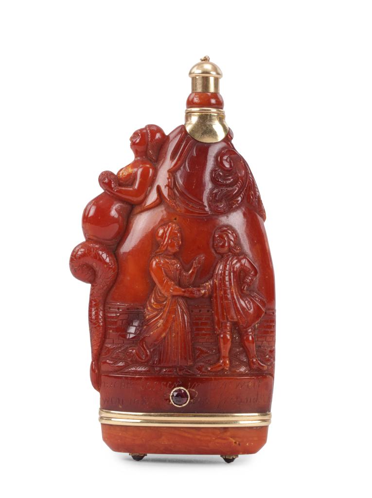 A ruby-set gold-mounted amber powder-flask
