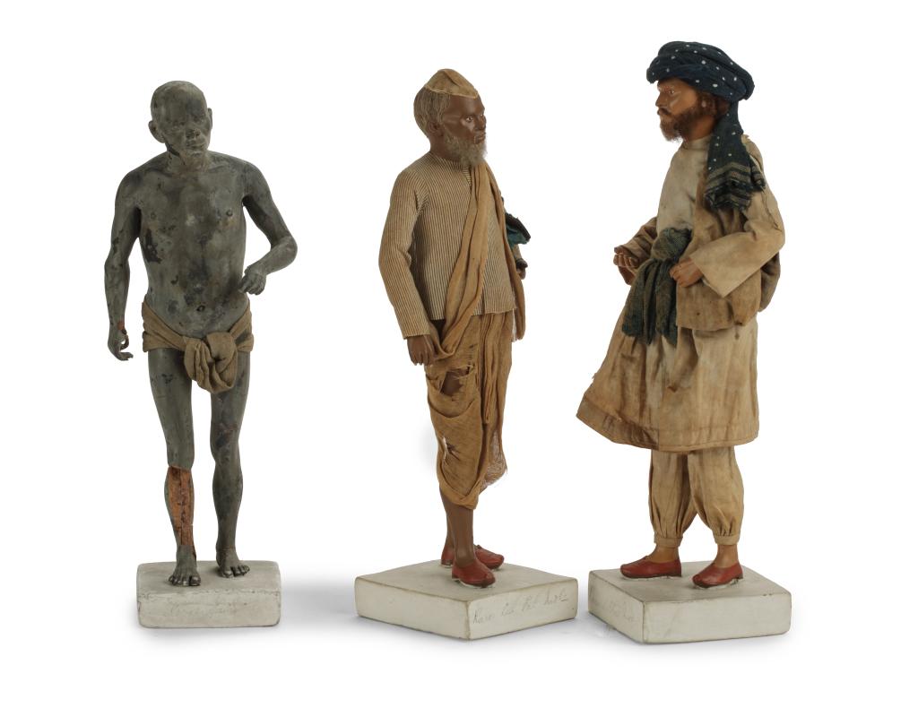 Three Indian unfired clay figures attributed to Jadunath Pal (1821-1920)