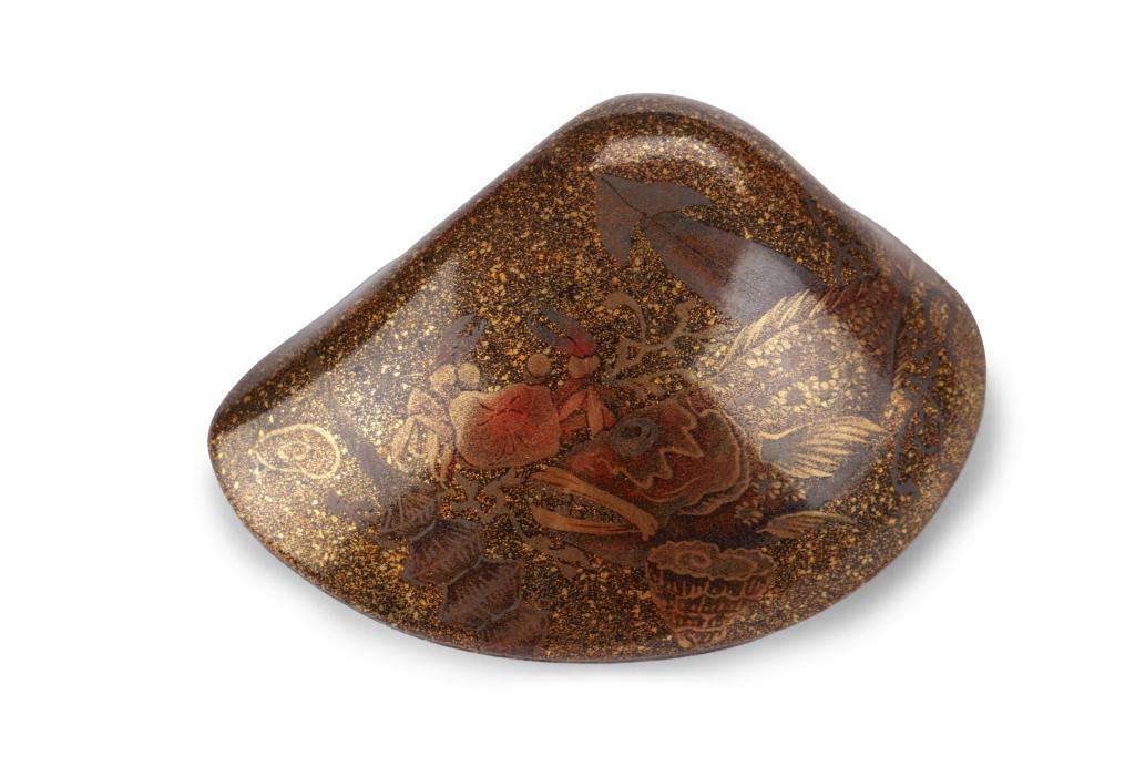 A large and highly refined lacquer netsuke of a clam signed Ozan