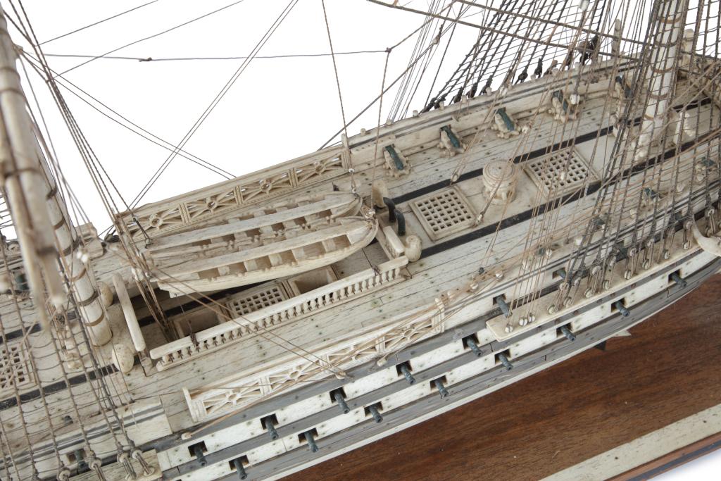A uniquely large Napoleonic Prisoner-of-War bone ship model of the H.M.S. Unicorn