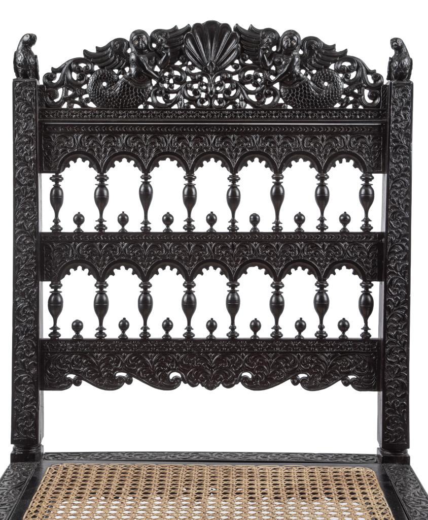 A set of six Indian colonial ebony side chairs
