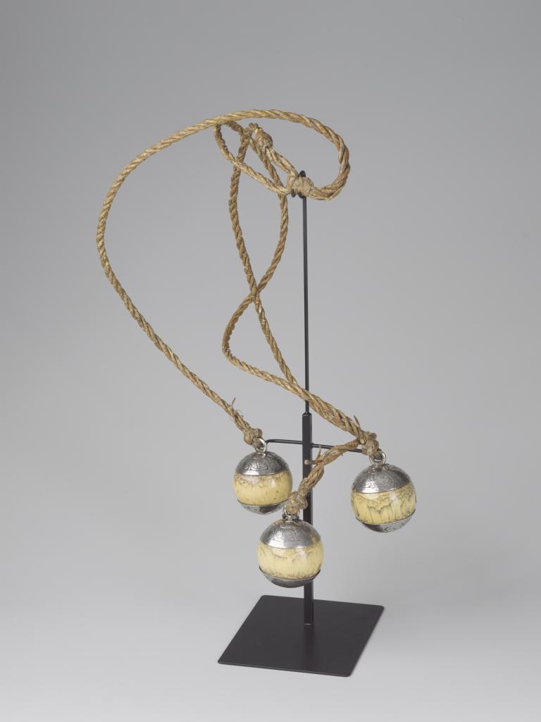 A set of ivory and silver mounted Gaucho 'Bolas' or 'Gaucho Balls' with leather lace