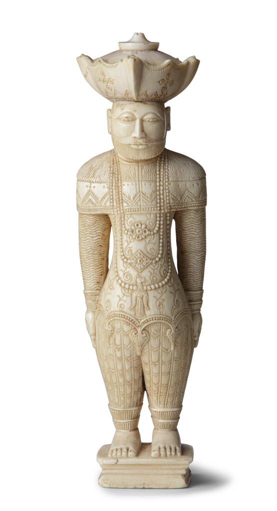 A Sinhalese ivory figure of a high nobleman