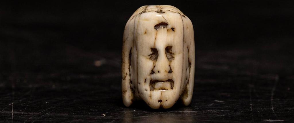 A Flemish carved ivory Janus-faced Vanitas Paternoster Rosary bead