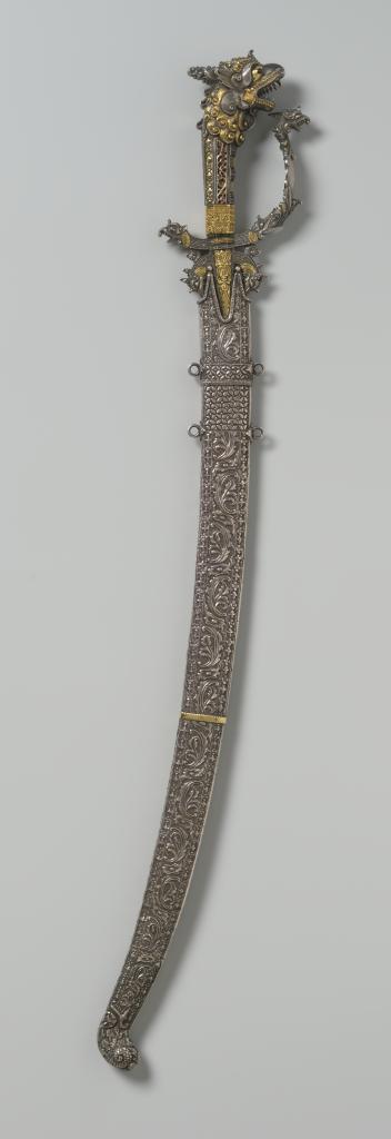 A superb Singhalese ruby-set gold,parcel-gilt silver and silver kasthane